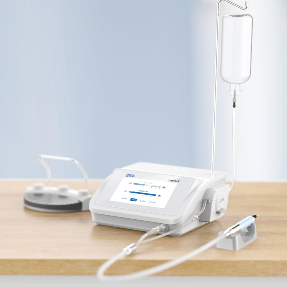 Moteur piézo SURGERY-X : coupe précise, sélective et froide. 14 inserts inclus. Idéal pour la chirurgie osseuse et implantologie.